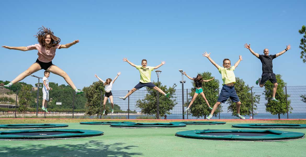 Why are trampolines for public use ideal for school playgrounds?
